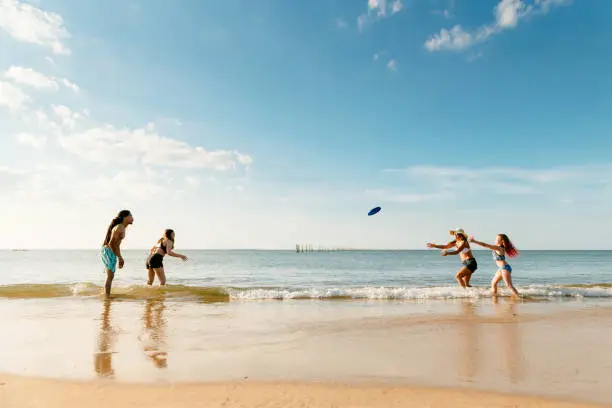 Multiracial family enjoying a day at the beach