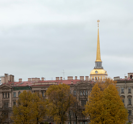 Spire of the main building of the Admiralty. View of the historic city center in autumn. Saint Petersburg, Russia.