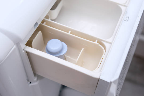istock A modern washing machine empty clean drawer, a washer container for detergent and laundry conditioner 1345389619