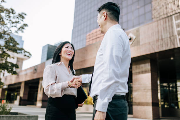 istock Business Associates Shake Hands 1345397709
