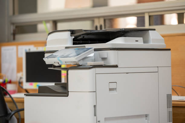 istock Close-up photocopier or printer Multi Purpose Copier Machine for scanning and copy paper. 1345407582