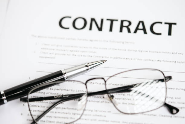 istock Pens and contract documents are placed on the desk. 1345407660