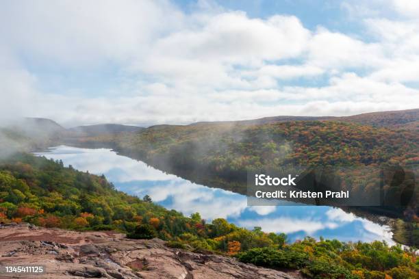 Clouds Reflecting In Mountain Lake In Autumn Stock Photo - Download Image Now - Autumn, Autumn Leaf Color, Beauty