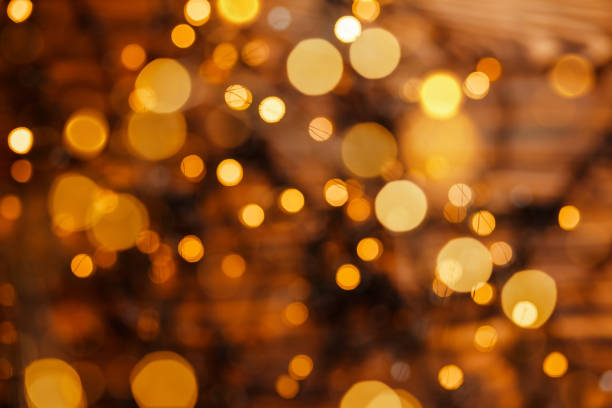 istock New Year, holiday blurred background. Gold bokeh light night luxury 1345418988