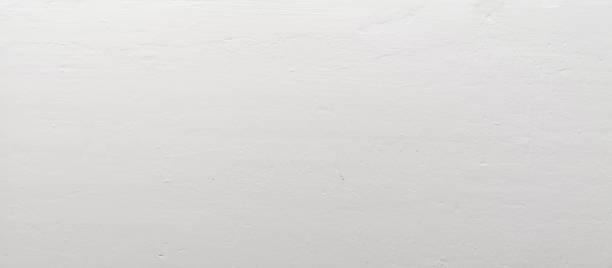 istock Paint white color on the Cement wall has gray color and smooth abstract surface texture concrete material background 1345423959