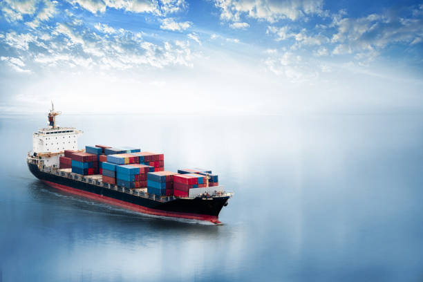 istock Container cargo ship in the ocean at sunset sky, Global business logistics import export background, Freight transportation, Shipping 1345429771