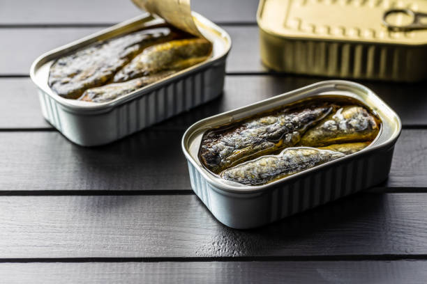 istock Canned sardines. Sea fish in tin can. 1345430584