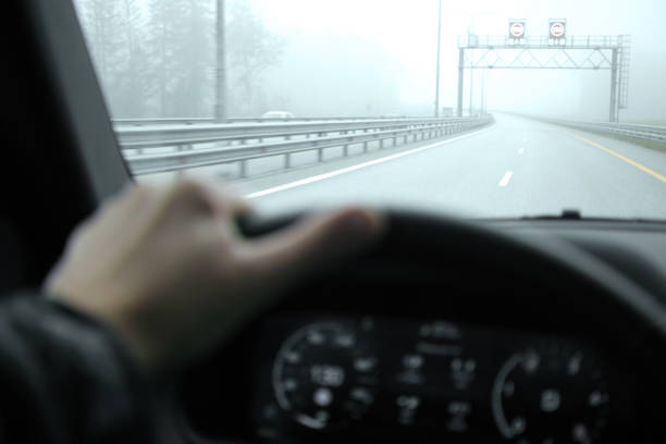istock driving in fog 1345441040