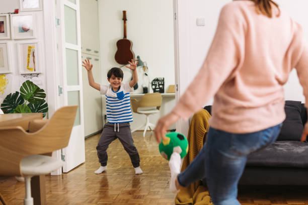 istock mother and her son at home 1345443940