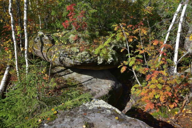 istock Geometrically regular even cracks with parallel walls in a stone massif 1345445944
