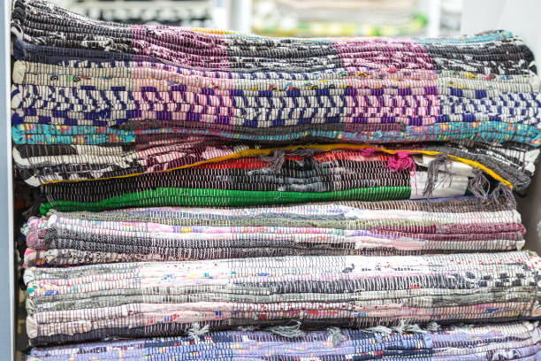 istock Textile industrial background with fabric texture, variation of multicolored soft carpets 1345446398