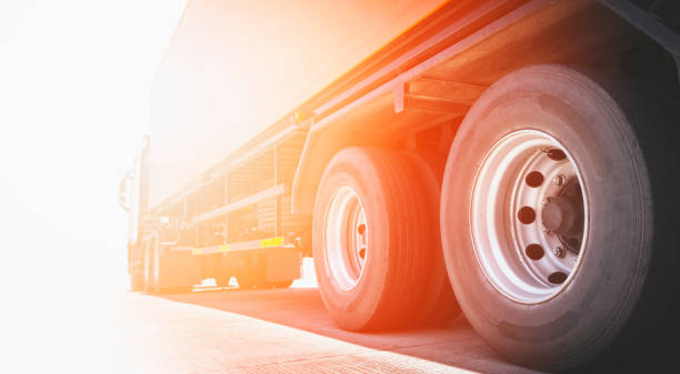 Semi Truck a Parking with Sunlight. Cargo Freight Truck Transportation. Semi Truck a Parking with Sunlight. Cargo Freight Truck Transportation. dump truck photos stock pictures, royalty-free photos & images