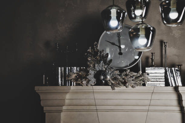 istock Christmas white clock with festive decorations close-up on fireplace 1345451583