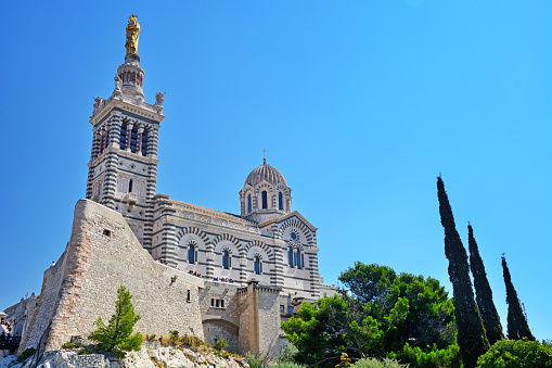Notre-Dame de la Garde is a Catholic basilica began in 1852 is icon that's visible from across Marseille, France