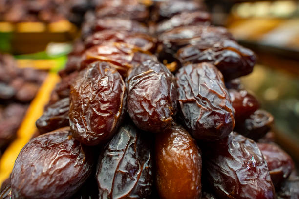 istock Dried date fruits background 1345454750
