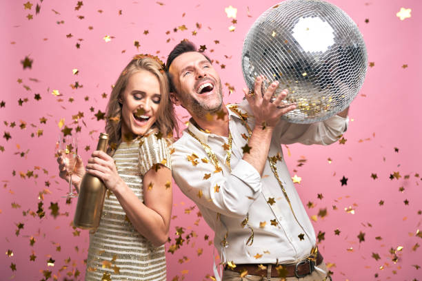 istock Couple dancing at the party 1345456753