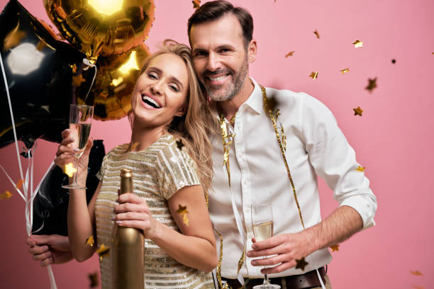 istock Happy couple celebrating New Year's Eve 1345456995
