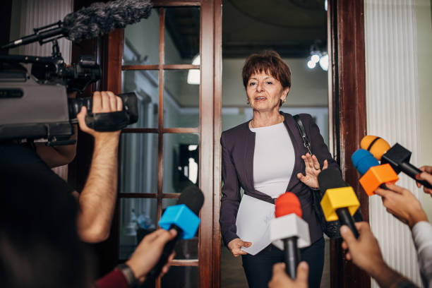 istock Woman addressing to the press 1345460414