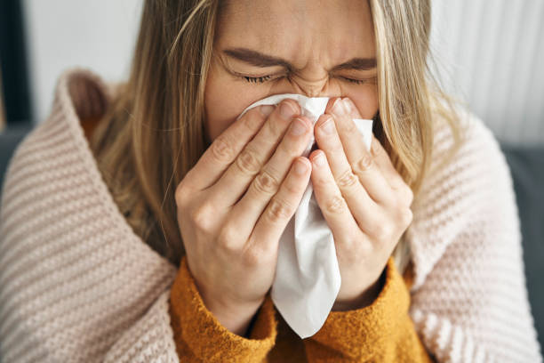 istock Woman having a very heavy flu 1345460423