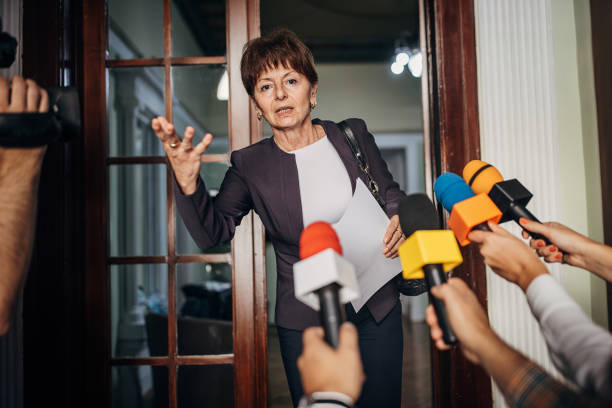 istock Woman addressing to the press 1345460769