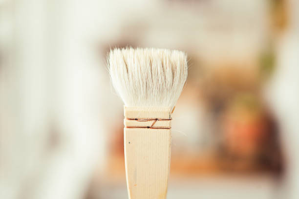 istock One big white paint brush. Fat light brush. 1345463745