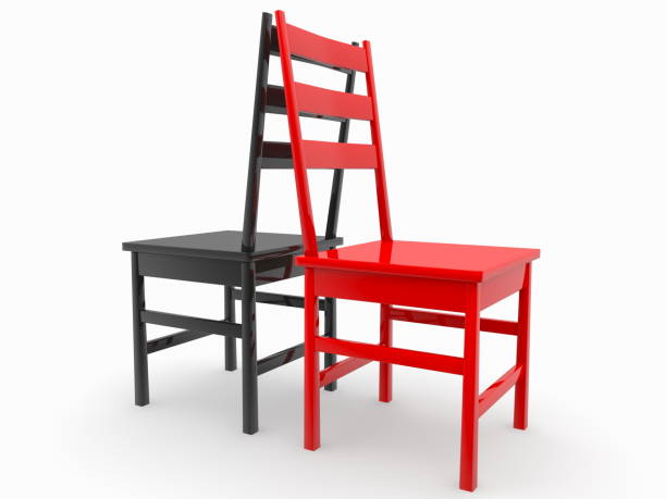 istock Concept of two chairs in black and red 1345464178
