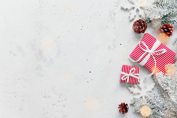 istock Christmas and New Year flat lay with two red white striped present gift boxes 1345464436