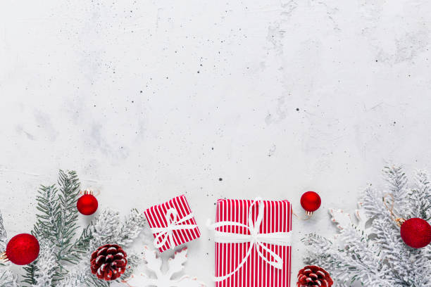 istock Christmas and New Year flat lay with two red white present gift boxes top view 1345464438