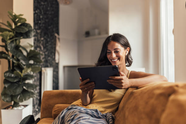 istock Adult woman, making sure she read everything. 1345465425