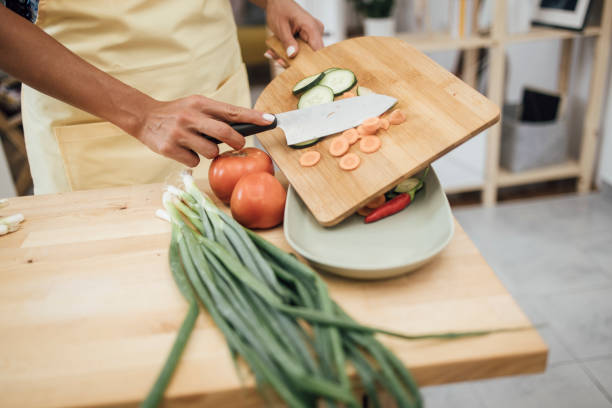 istock Unrecognizable woman making a vegan meal 1345465737