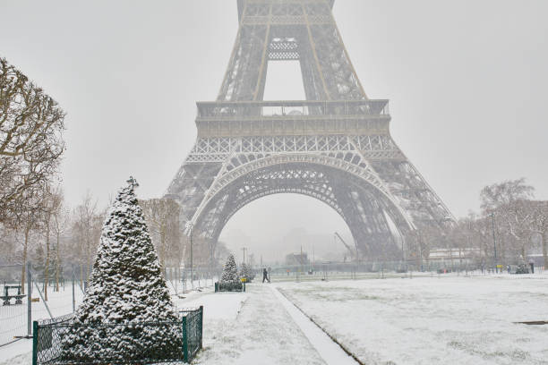 istock Scenic view to the Eiffel tower on a day with heavy snow 1345467126