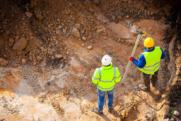 Surveyors at the construction site stock photo