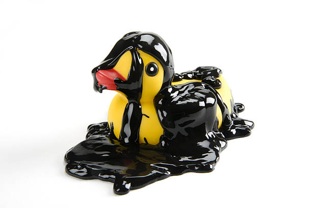 istock rubber duck covered in oil 134546936