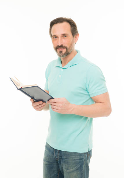 istock Man mature bearded hold book isolated white background. Useful information. Self education. Home education and self improvement. Education for adult. Confidence and intelligence. Never too late study 1345469492