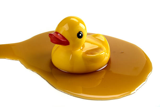 istock rubber duck covered in oil 134546970