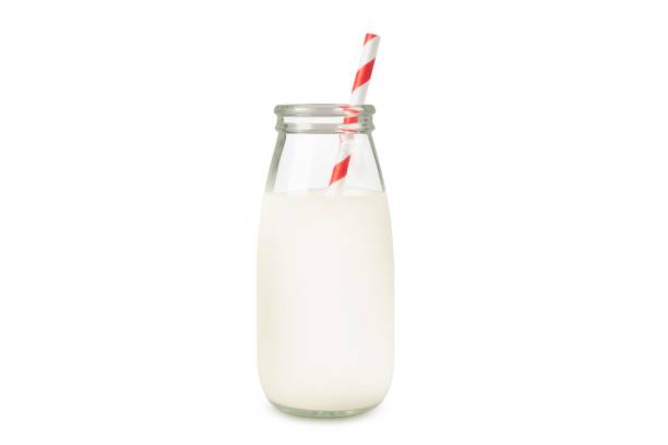 bottiglie di latte con cannucce rosse - milk bottle milk bottle empty foto e immagini stock