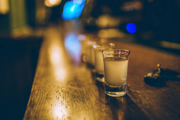 술과 함께 찍은 안경 - vodka shot glass pub glass 뉴스 사진 이미지