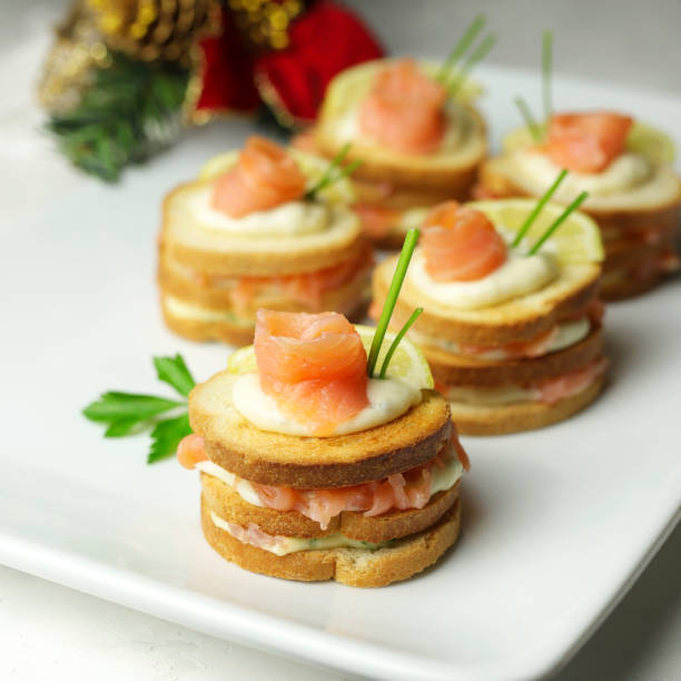 istock Christmas appetizer. Gorgonzola cheese and smoked salmon. 1345478909