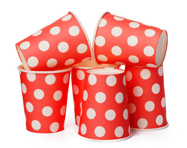 istock Group of cardboard disposable red dotted cups isolated 1345481537