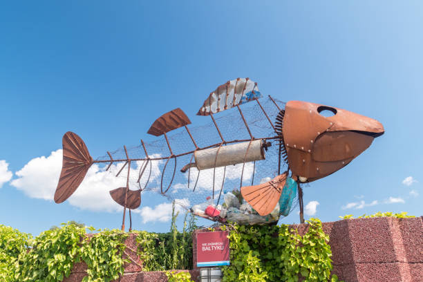 Hel, Poland - July 20, 2021: Fish sculpture with plastic waste and trash from sea.