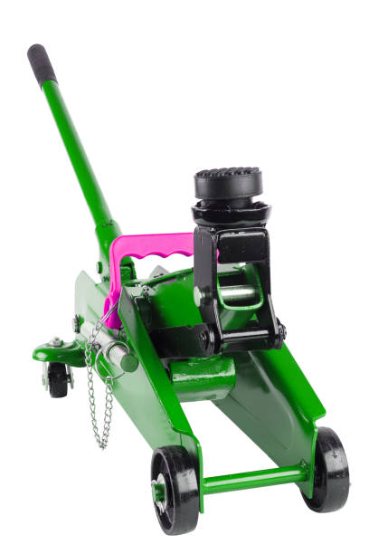 istock green hydraulic car jack isolated on white background 1345483970
