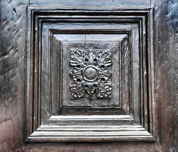 istock Vintage decoration on wooden door. 1345484874