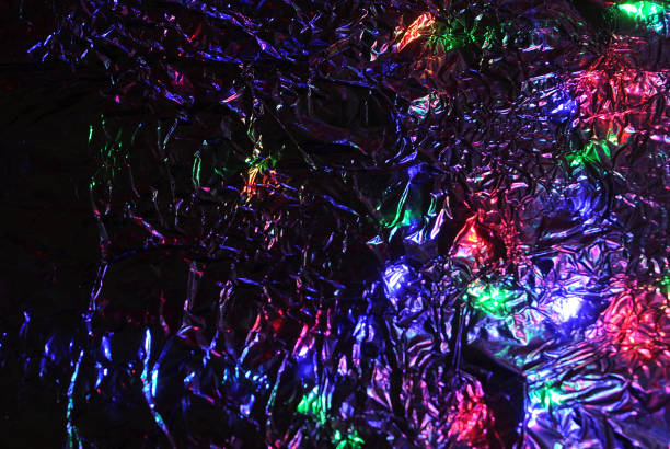 istock Blurred texture of trendy holographic foil. 1345485774