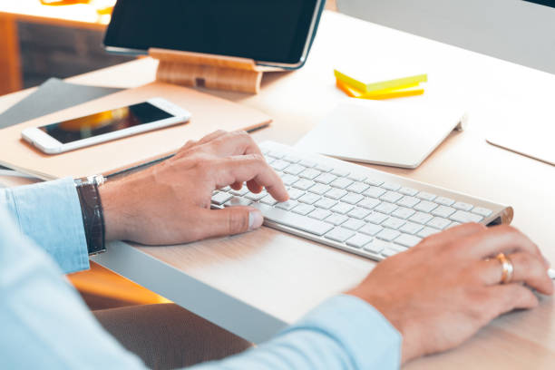 istock business man working in an office at his workplace 1345486917