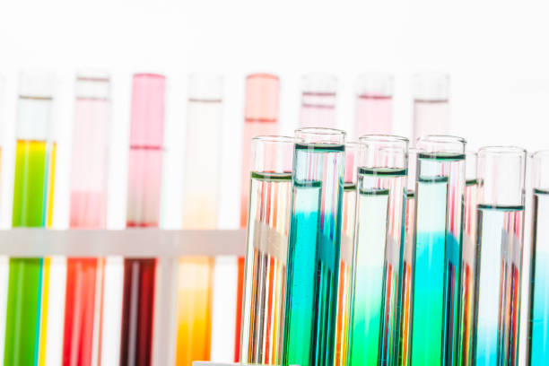 istock Glass laboratory chemical test tubes with liquid for analysis close up 1345487706