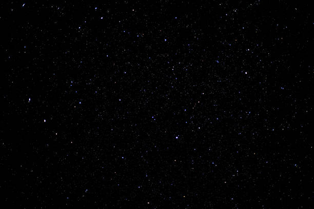 istock Starry sky background with bright stars in dark night sky 1345488190