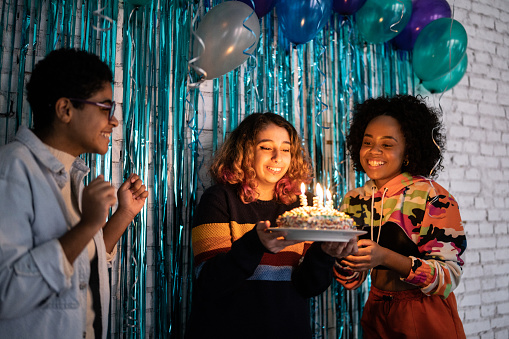 Girls celebrating birthday at home