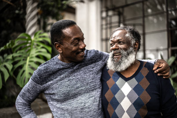 istock Two brothers looking at each other at home 1345489135