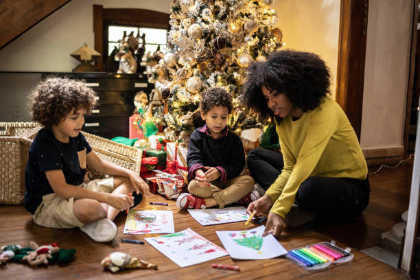 istock Siblings drawing for Christmas at home 1345490866