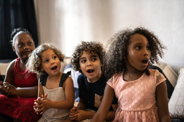 istock Surprised kids on Christmas Day at home 1345490889